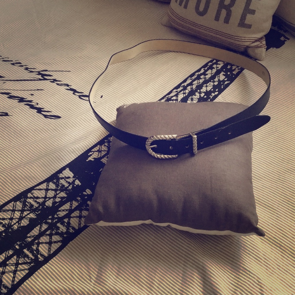 Black fashion belt with silver buckle